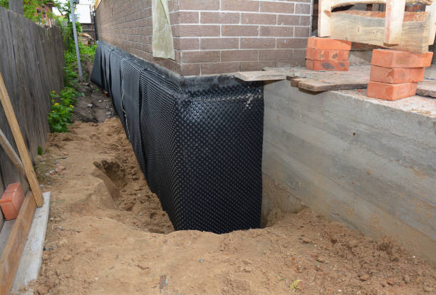 Happy homeowners after waterproofing job in Kirkersville